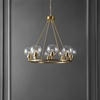 image:imageSAFAVIEH Lighting Collection Sveda MidCentury Modern Brass 8Light Wagon Wheel Chandelier Round Light Fixture Ideal for Dining Room Kitchen Island Foyer Entryway LED Bulb Included