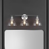 image:imageSAFAVIEH Lighting Collection Calyna BlackClear 3light Wall Sconce Light Fixture Ideal for Bathroom Entryway Vanity Foyer Hallway Living Room LED Bulbs IncludedChrome
