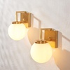 image:imageSAFAVIEH Lighting Collection Ganon Contemporary BrassOpal Orb Wall Sconce Set of 2BrassWhite