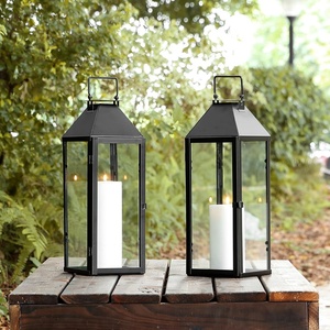 image:imageSAFAVIEH Lighting  Ruane Set of 2 Black Metal amp Clear Glass Outdoor Lanterns  Modern Decorative Candle Lanterns for Patio Porch amp Garden 55 W x 525 D x 175 H PLT4056A