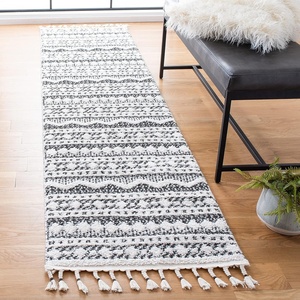 image:imageSAFAVIEH Moroccan Tassel Shag Collection Area Rug  55 x 77 Ivory amp Black 075inch Thick Ideal for High Traffic Areas in Living Room Bedroom MTS484AIvoryBlack