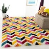 image:imageSAFAVIEH Kids Shag Collection Accent Rug  3 x 5 Ivory amp Multi Rainbow Design NonShedding amp Easy Care 2inch Thick Ideal for High Traffic Areas in Entryway Living Room Bedroom SGK565A