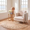 image:imageSAFAVIEH Area Rug 4 Round  Natural Fiber Collection  Navy Handmade Jute Boho Farmhouse Braided Design NF364NIvory