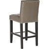 image:imageSafavieh Mercer Collection Thompson Cream Leather 258inch Counter StoolClay